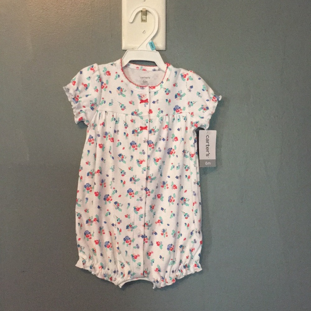 Snap-up romper.
